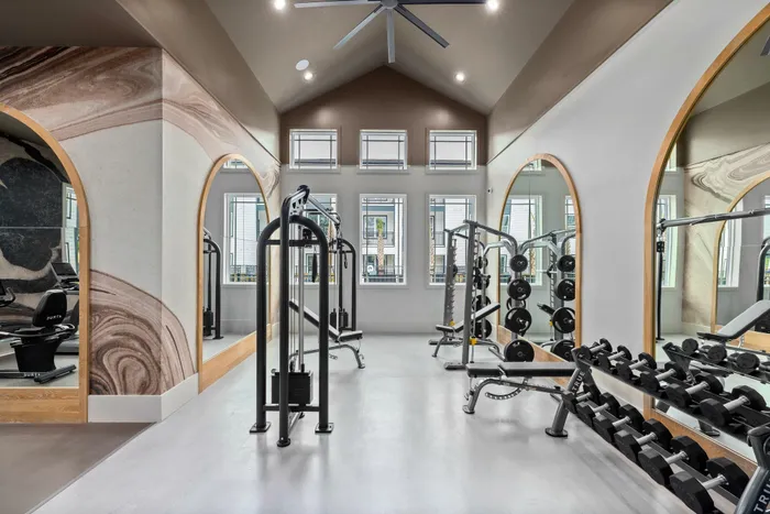 Apartment fitness center with free weights and strength training equipment