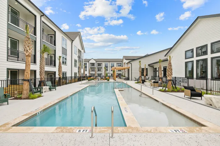 Resort-style swimming pool at Asher apartments in North Charleston, SC