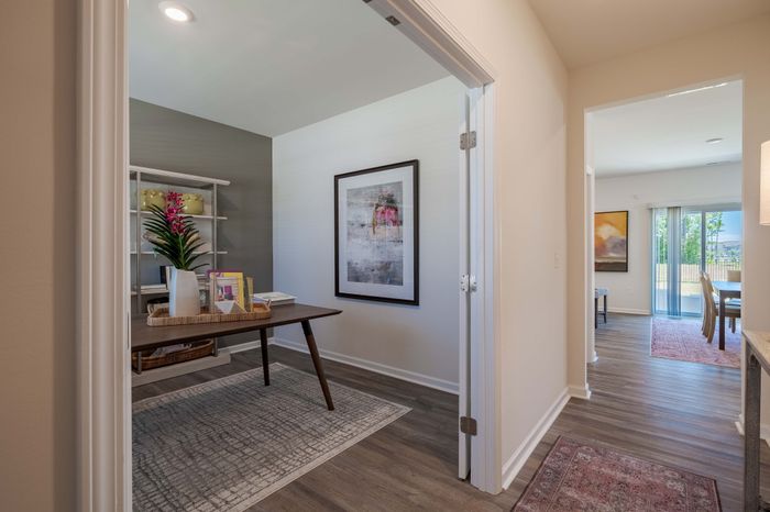 office and hallway with desk and french doors