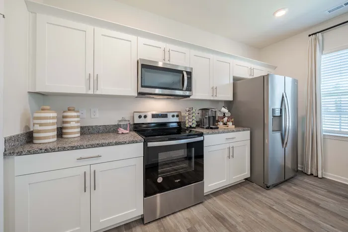 kitchen with white cabinets