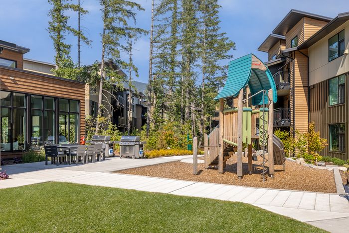 Seating and grill area with playground