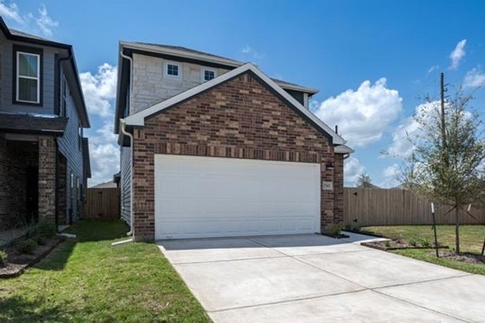 Summerwell exterior with 2 car garage