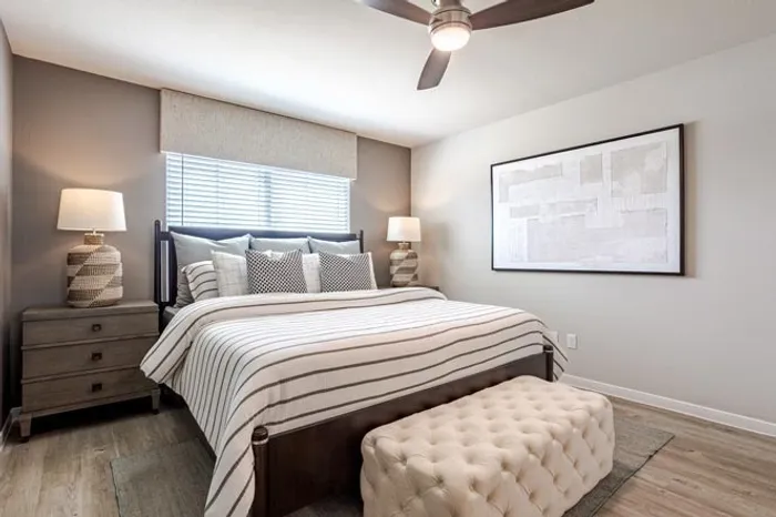 bedroom with tan bedding