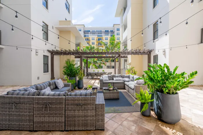 Outdoor patio beside luxury Boca Raton Florida apartments.