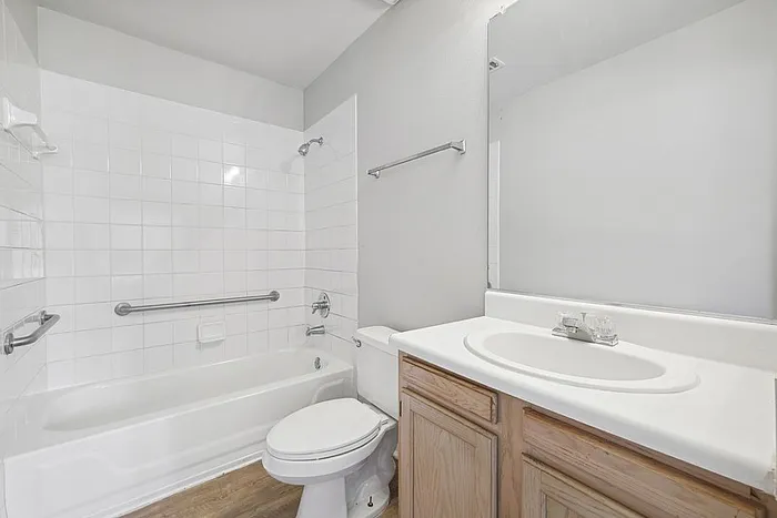 Bathroom with tub style shower.
