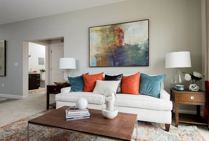 Living room couch with coffee table and lamps