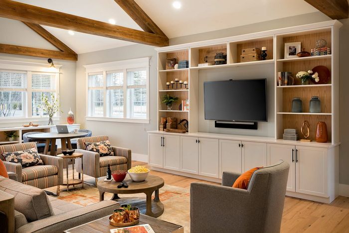 cluibhouse tv room with couch and seating