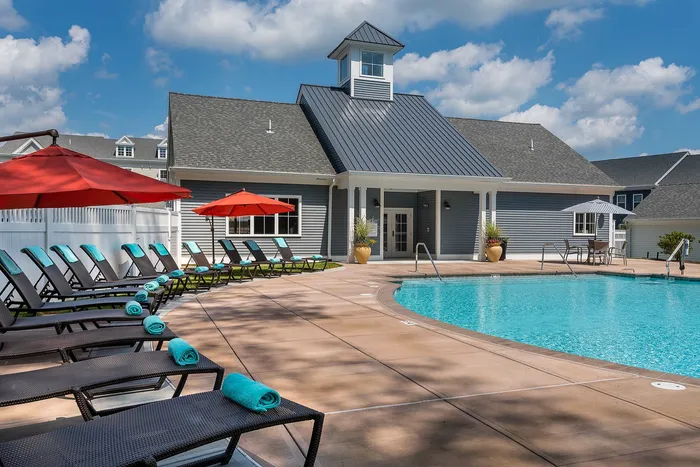 Property Pool house and pool and pool lounge chairs