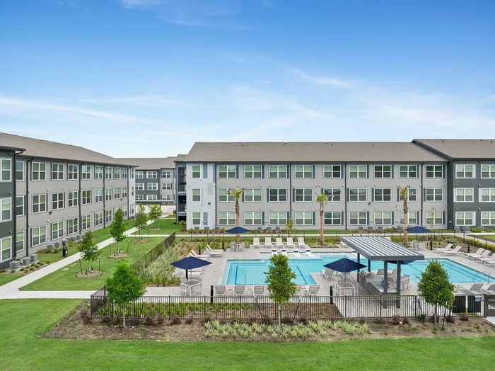 Apartment buildings with pool in view