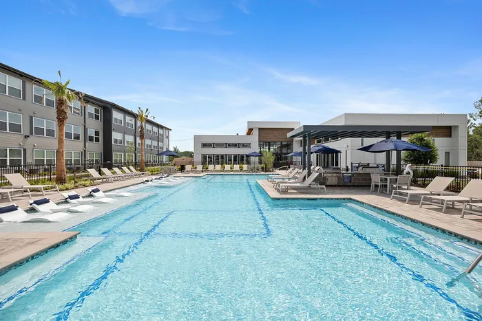 Pool with Clubhouse Exterior
