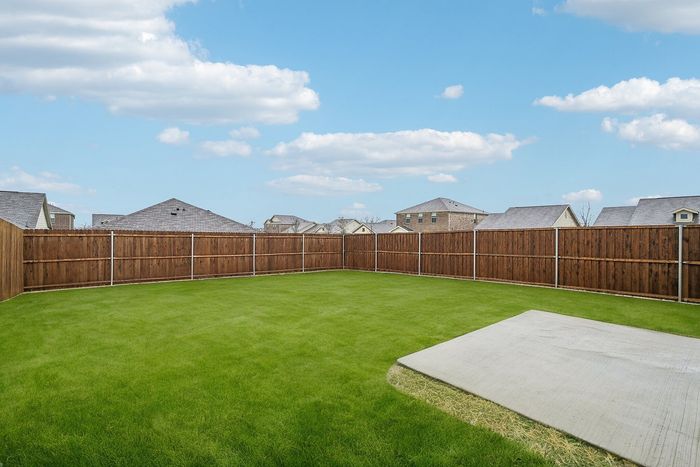spacious fenced in back yard
