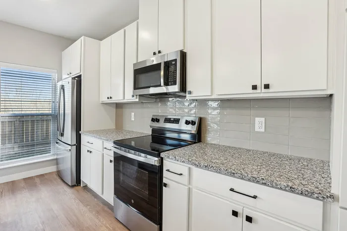 kitchen with white cabinets