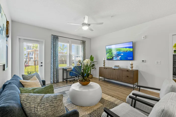Spacious living room with tv