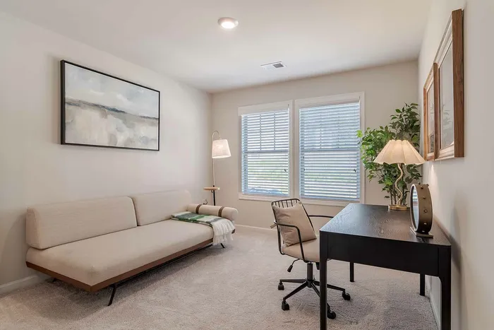 bedroom with day bed and desk