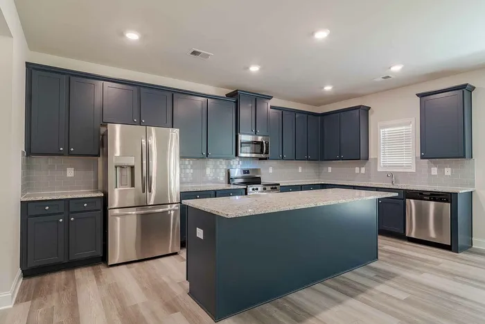 kitchen with navy cabinets