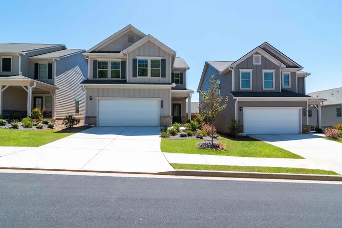 exterior two story house with two car garage
