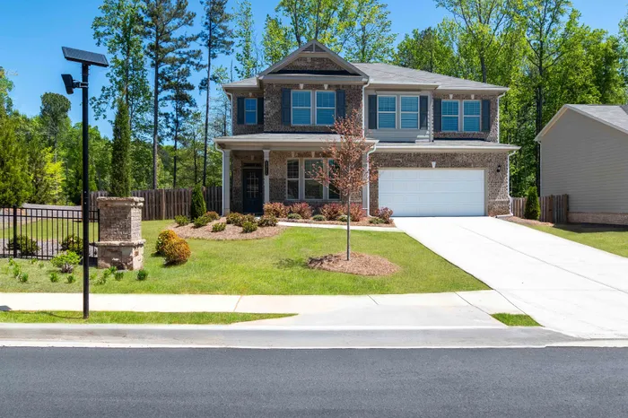exterior two story house with two car garage