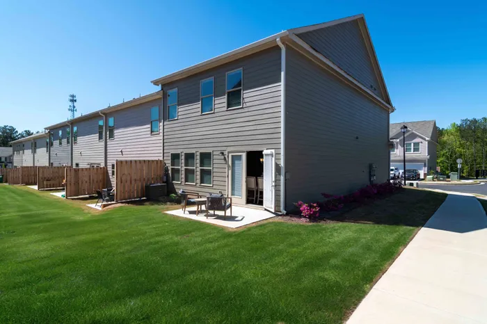 exterior back yard with patio of two story house