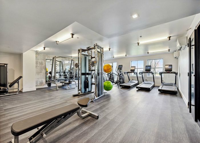 Newly renovated fitness center with cardio & weight training equipment