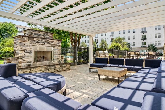 Multiple outdoor lounge areas with secluded seating