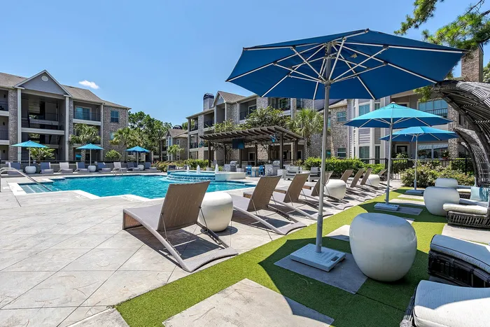 Pool Area with unbrellas