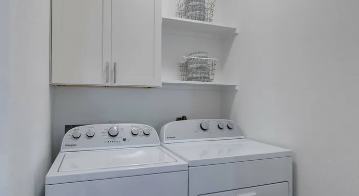 Laundry room with washer/dryer hook ups