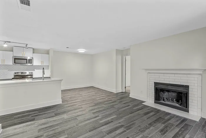 kitchen fireplace and living room