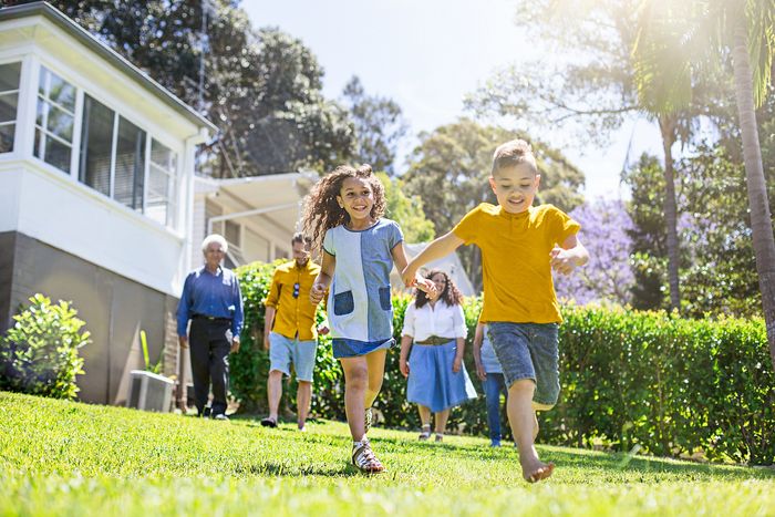 kids running in grass
