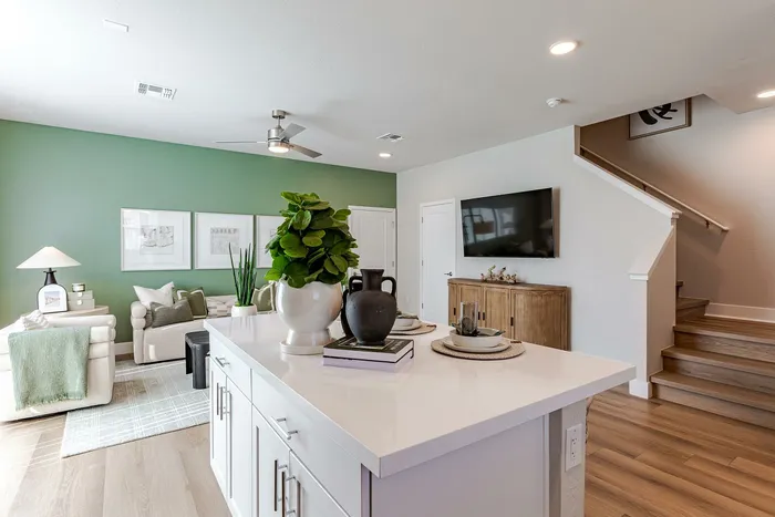 Stair landing leading to kitchen