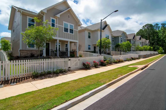 street of single family fenced in homes