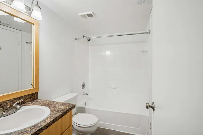 tan cabinet bathroom