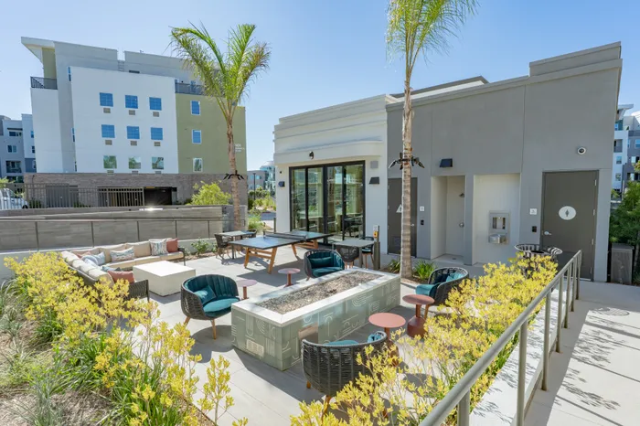 rooftop terrace with outdoor seating, firepit and games