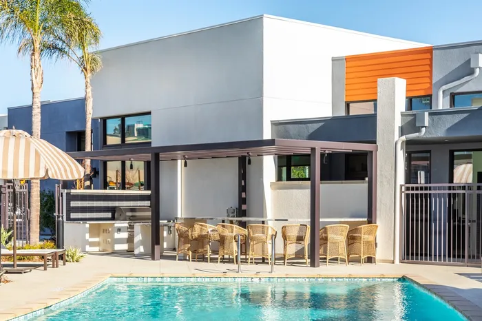 outdoor swimming pool and grilling area