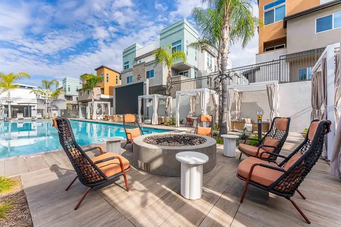 Poolside fire pit and cabanas