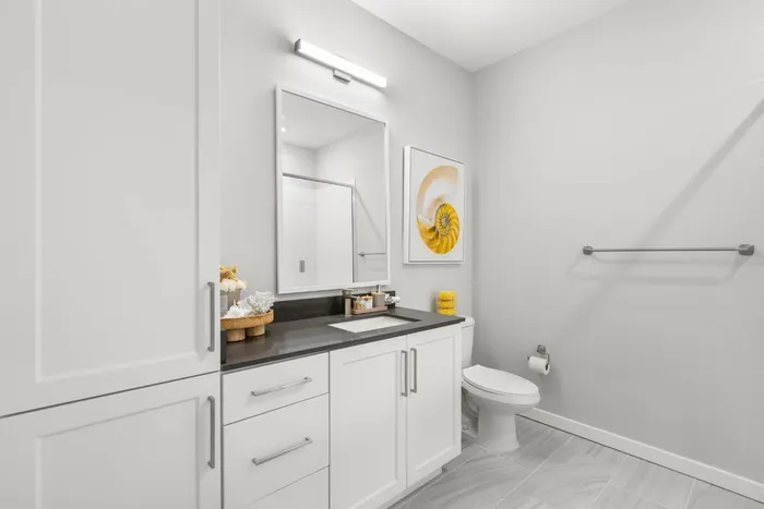 Bathroom vanity with attached linen cabinets