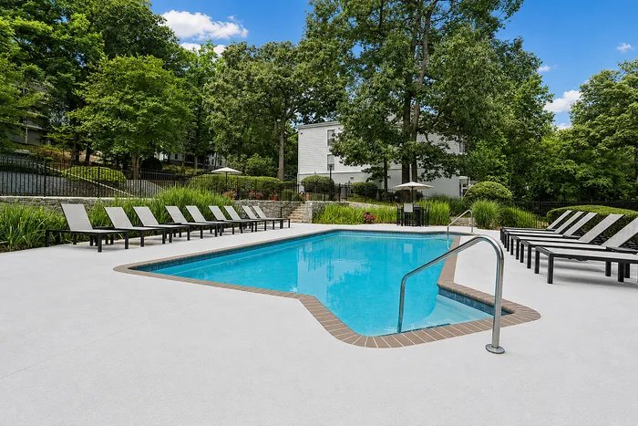 Pool with lounge chairs at Avana Cumberland in Atlanta, Georgia.