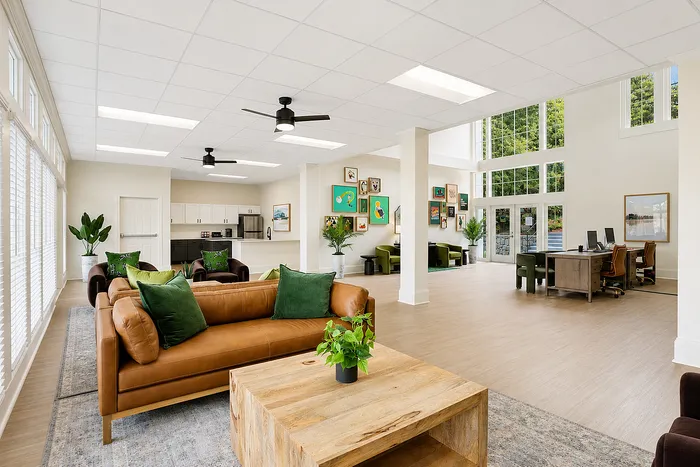Clubhouse lounge with community kitchen at Avana Cumberland in Atlanta, GA.
