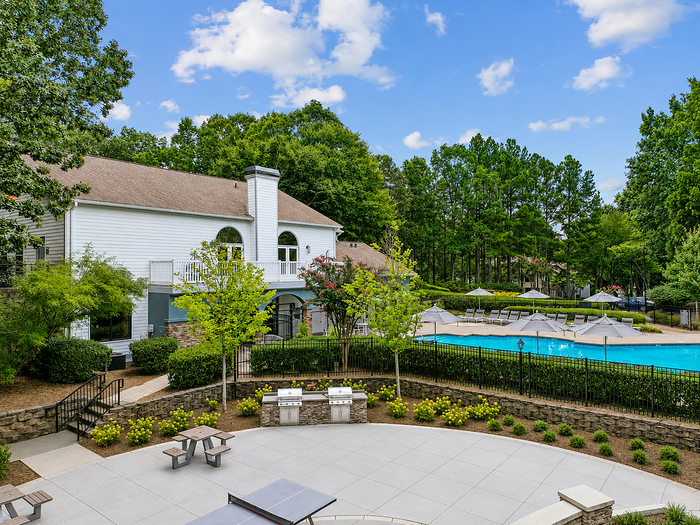 Social lawn with ping pong, picnic tables, grills and outdoor dining at Avana TownPark in Kennesaw, GA