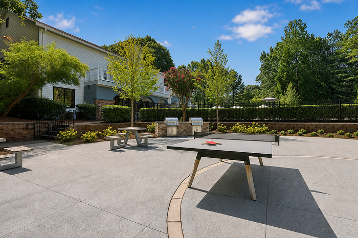 Outdoor ping pong table in the social lawn at Avana TownPark apartments in Kennesaw, GA