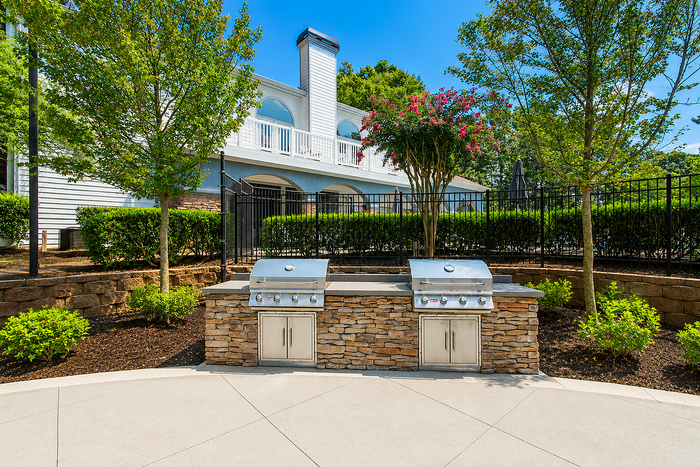 Outdoor grilling stations at Avana TownPark apartments in Kennesaw, GA