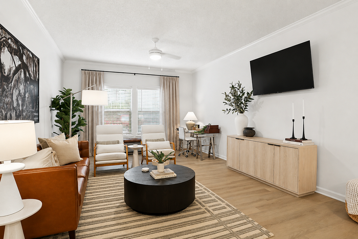 Renovated Diamond apartment living room with luxury vinyl plank flooring at Avana TownPark in Kennesaw, GA