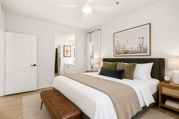 Diamond renovation bedroom with adjoining bathroom at Avana TownPark apartments in Kennesaw, GA