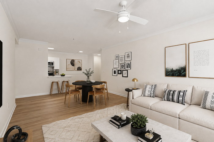 Bright apartment living and dining room with open layout at Avana TownPark in Kennesaw, GA