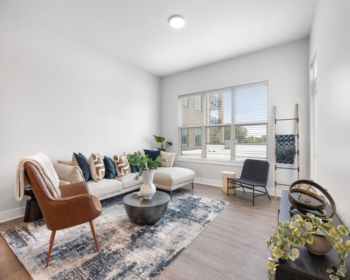 Bright living room with corner sofa