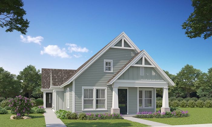 Charming suburban home with classic gable roof, surrounded by lush greenery and vibrant landscaping.