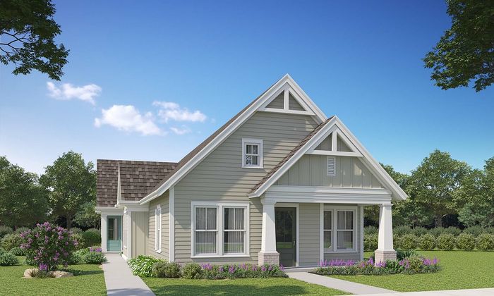 Charming single-story home with a peaked roof, elegant windows, and beautiful landscaping under a clear blue sky.