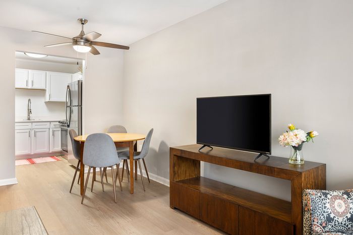 Living room with attached kitchen