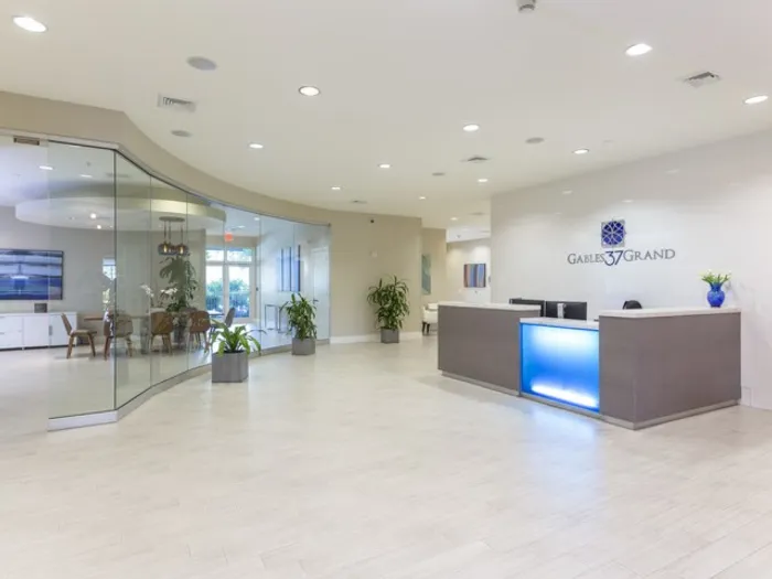 Gables 37 Grand, interior, spacious lobby, concierge desk