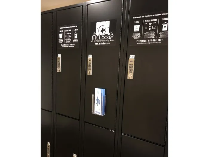 Colony at Dadeland Interior | Laundry service room | Several lockers in rows