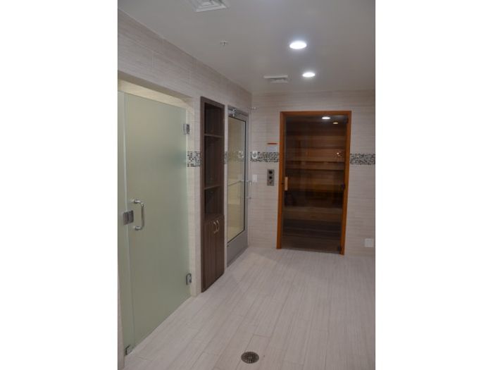 Intracoastal Yacht Club, intgerior, full service spa and sauna with steam room, glass doors, tile flooring